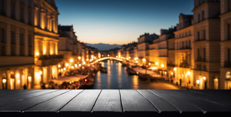 Obraz premium empty black wood surface with blurred historic cityscape at dusk; best for tourism marketing.