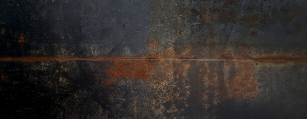 grunge orange rusty on dark black metal wall background texture used as banner panorama. steel...