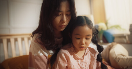 Korean Mother and her Daughter Having a Peaceful Morning Together, Talking and Bonding....