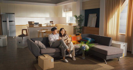 Family Home Moving in: Happy and Excited Young Korean Couple Enter Newly Purchased Apartment....