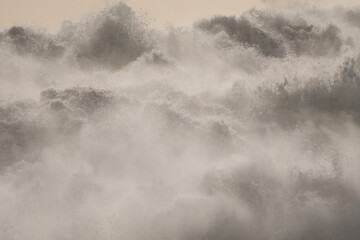 high sea, crashing waves, turbulent ocean, abstract nature background showing spring tide close up