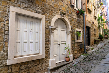 charming little village in Croatia called the istrian Toscana with nice white entrance door