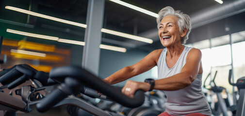 Fototapeta na wymiar An older smiling woman engages in fitness or exercise, demonstrating her commitment to health.