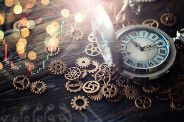 Old clock macro. Old mechanical clock gears and cogwheels on wooden background