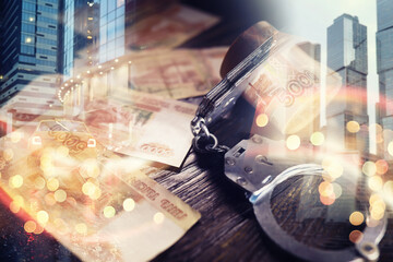 Double exposure of male hands locked in handcuffs city landscape background. Hands in handcuffs...