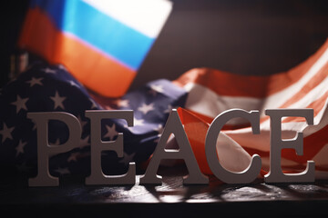 Peace Word Written In Wooden Letters. International conflict, American hegemony, War. Ukraine and...