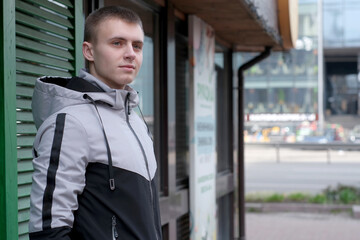 Urban street portrait of a young guy