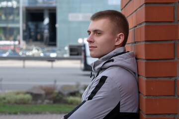 Urban street portrait of a young guy