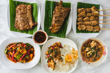 Many types of delicious food made from crocodile meat. Grilled crocodile steak with Thai spicy dipping sauce or Jaew sauce,Hot spicy crocodiles soup,Spicy stir fried crocodile,Grilled crocodile steak.
