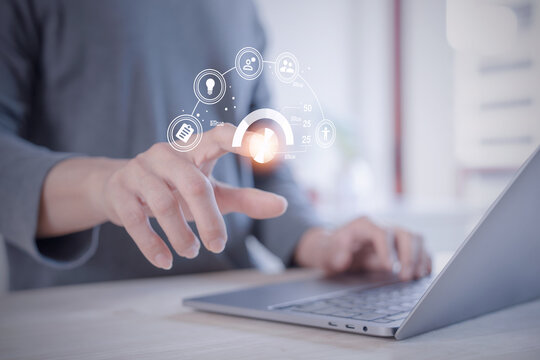 person planning the business plans and analyse  profitability of working companies with digital augmented reality graphics for project manager working on laptop and updating business plan