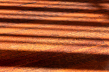 Light Reflections Dancing on an Oak Surface: Elegant Texture and Warm Atmosphere.