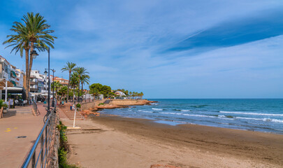 Alcossebre beach Spain Costa del Azahar with palm trees, beach and seafront