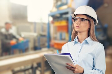Young engineer on factory, work checking up process