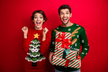 Photo of excited family lady guy hold pile stack gift packages on christmas midnight isolated bright color background