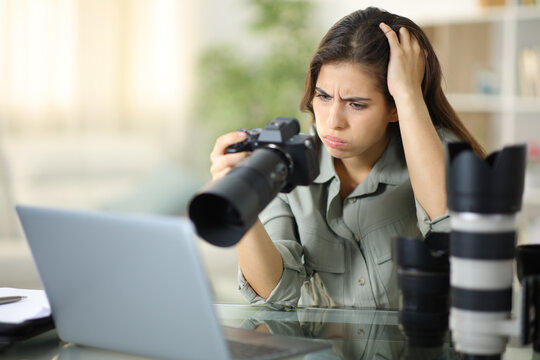 Worried photographer checking result at home