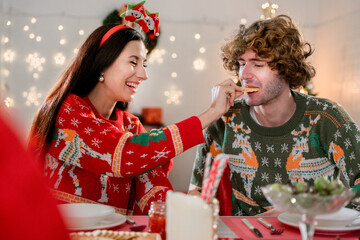  happy family married couple baking christmas cookies and laughing. Merry Christmas and Happy Holidays. Family preparation holiday food.