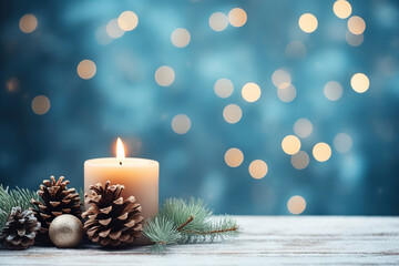 Christmas - Banner Of 1 candle and xmas ornament, Pine-cones And green Spruce Branches minimal blue background and lights in the back, with empty copy space