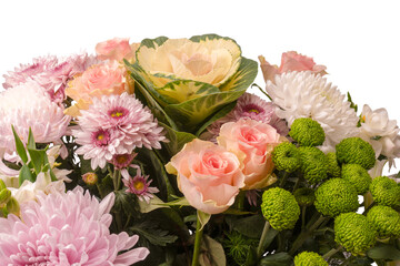 Bouquet of beautiful flowers with pink roses, brassica flower, chrysanthemum and freesia flower.
