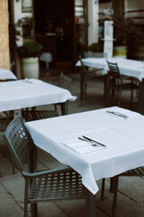Table served for lunch in a street cafe on a sunny day.