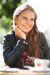 Teenager, smile and relax at outdoor coffee shop, cafe or restaurant with espresso, latte or...