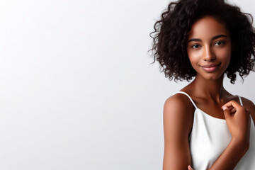 Fototapeta premium Portrait image of a young African American woman wearing standing on a white background. ai generative