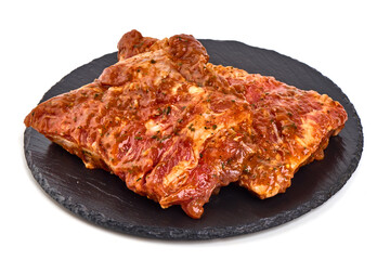 Raw bbq ribs, marinated meat for grill, isolated on white background.