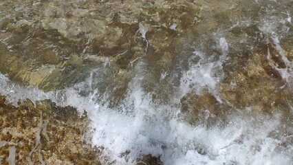 water flowing over rocks