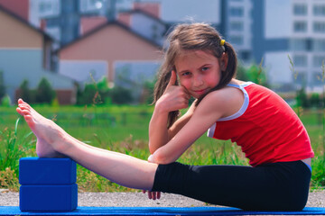 Portrait of young beautiful fitness sport girl in fashion sportswear doing yoga fitness exercise....