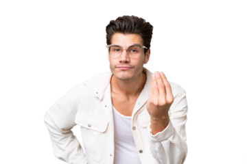 Young handsome caucasian man over isolated background making Italian gesture