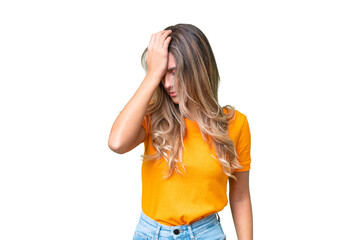 Young Uruguayan woman over isolated background with headache