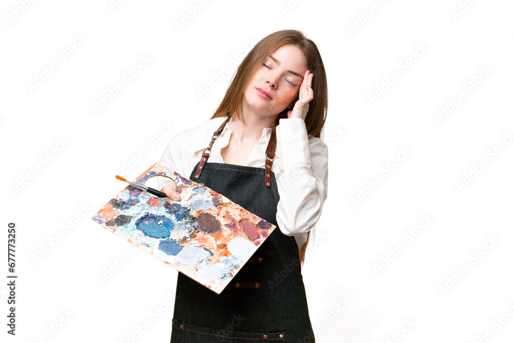 Wall mural Young artist woman holding a palette over isolated chroma key background with headache