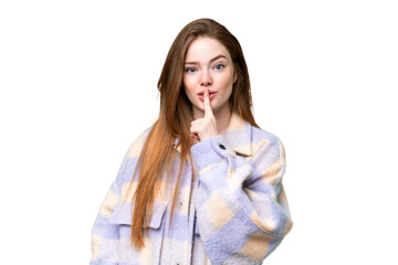 Young pretty woman over isolated chroma key background showing a sign of silence gesture putting...