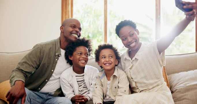 Happy black family, sofa and selfie for photography, picture or memory together in relax at home. Face of African mother, father and children smile for photograph or social media on couch at house