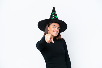 Young caucasian woman costume as witch isolated on white background points finger at you with a confident expression