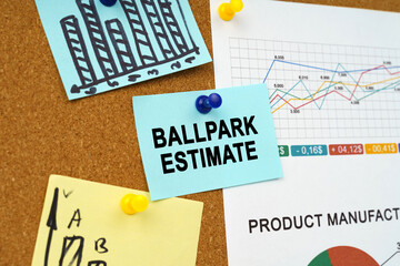 Business charts and stickers with the inscription hang on the board - BALLPARK ESTIMATE