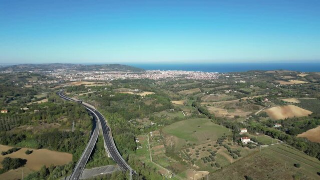 Vista aerea da Novilara della citt&agrave; di Pesaro con l'autostrada A14 il mare e le colline circostanti
