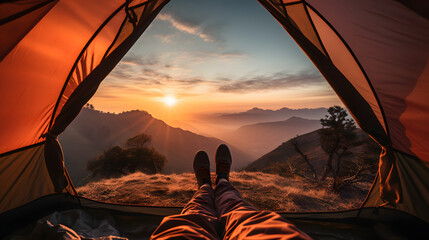 two feets under tent in the sunset on the moutain	 - obrazy, fototapety, plakaty
