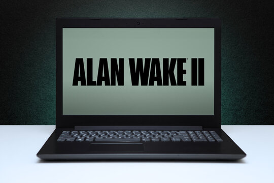 Alan Wake 2 game on laptop screen on black textured wall with green light. Astana, Kazakhstan - November 13, 2023.
