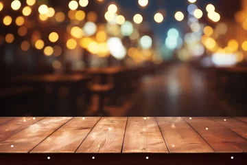 Fotobehang In the foreground, a wooden table is highlighted against an abstract and blurred restaurant lights background, setting the mood for an evening of culinary delights. Created with generative AI tools © Oleksii
