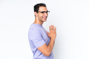 Young caucasian man isolated on white background scheming something