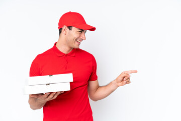 Pizza delivery caucasian man with work uniform picking up pizza boxes isolated on white background...