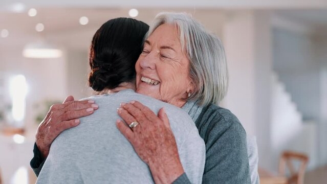 Senior, woman or daughter with hug and happy in living room of home for reunion and love. Family, mother or girl child with embrace, smile or bonding in lounge of home for relationship, care or visit
