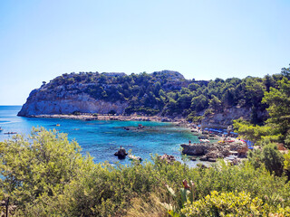 Faliraki beach in a marvelous rocky cove, Rhodes Island, Greece.