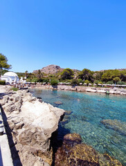 People enjoying the beach resort of Kallithea Springs, Rhodes Island, Greece.