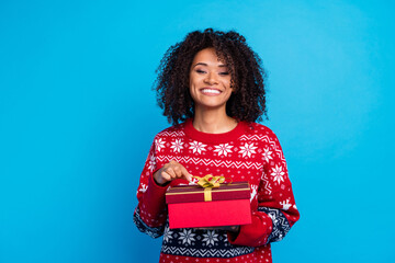 Photo of cheerful young satisfied woman wear red sweater unboxing surprise for holly christmas...