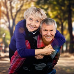 Portrait of a beautiful old couple in the park.