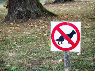 sign for dogs in park