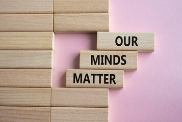 Our Minds Matter symbol. Concept words Our Minds Matter on wooden blocks. Beautiful pink...
