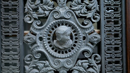 Beautiful adornment by door facade, traditional European ornamentation in building architecture...