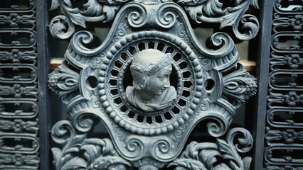 European Elegance - Traditional Adornment Beside Door Facade Close-Up